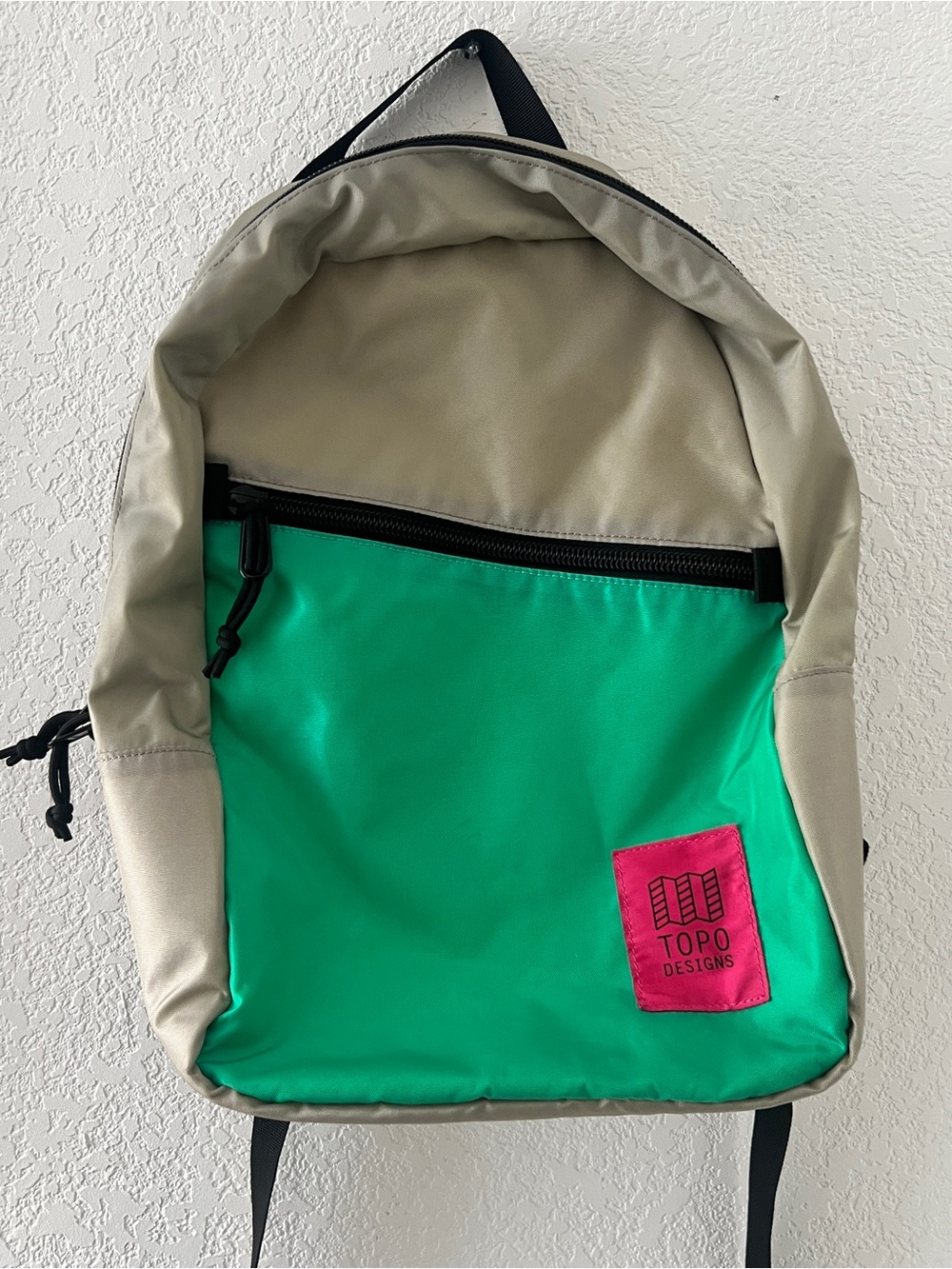 Topo Designs Light Pack Green Front-Pocket Backpack with Tan Body and Pink Logo